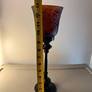 Elegant Amber Glass Candle Holder With Black Stem